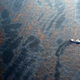 A boat cleans up oil during the 2010 Deepwater Horizon oil spill.